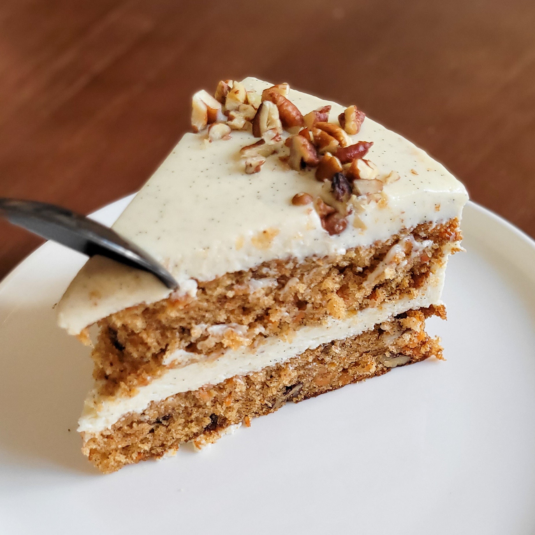Rich, creamy, moist and delicious carrot cake cheesecake! The best birthday cake in Hong Kong for our carrot cake lovers. No raisins!
